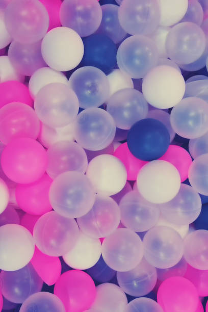 istock Background of colored balls of the same size, texture muted soft tones 1200765756