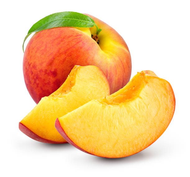 istock Peach slice isolate. Peach whole, slice, leaf on white. Peaches. Full depth of field. 1200767789