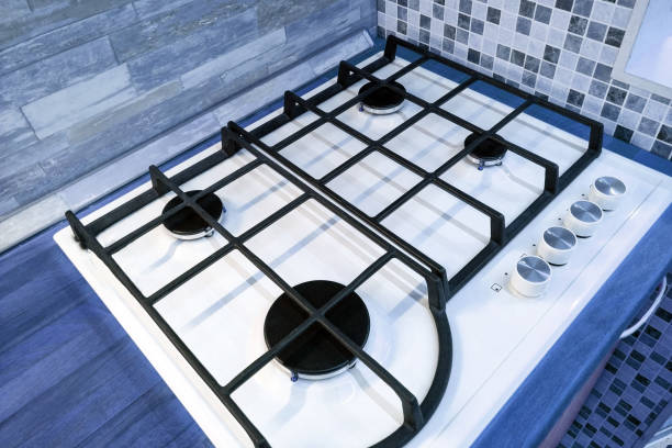 istock Gas stove in modern blue kitchen 1200767808