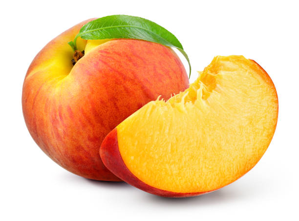 istock Peach isolate. Peach slice and whole with leaf on white. Peaches. Full depth of field. 1200768011