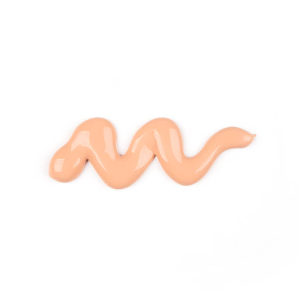 Smear of Foundation on a white isolated background. BB cream, makeup concept