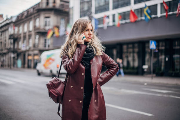 istock Young woman talking on phone 1200768365