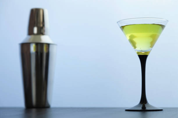 istock cocktail glass and cocktail shaker on white 1200769717