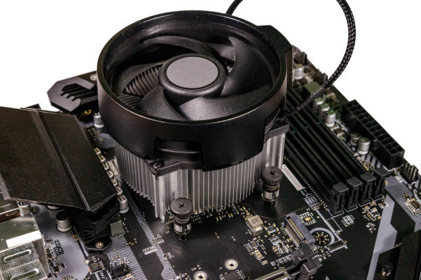 istock Close-up of a modern computer motherboard with installed cpu and cooler. Electronic computer hardware technology 1200771015