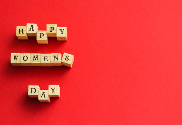 istock happy womens day folded from wooden cubes with letters 1200773735