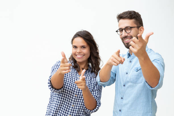 istock Content young couple showing finger guns 1200775896