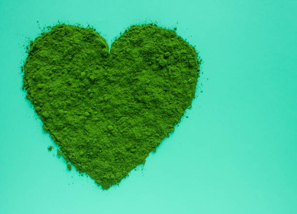 istock Matcha green tea powder in heart shape 1200778011