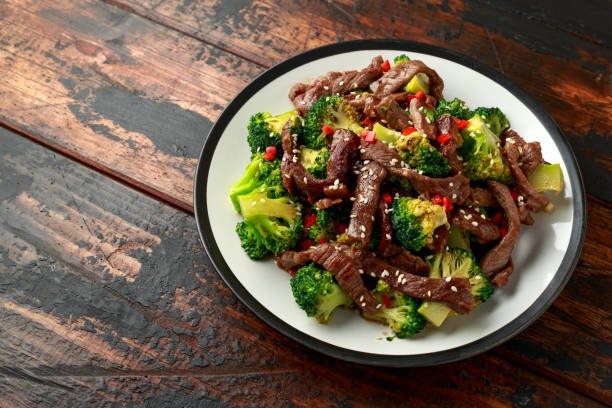istock Homemade Beef and Broccoli on wooden table 1200778205