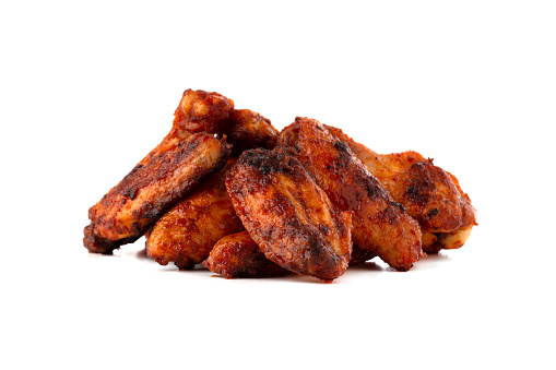 Fried wings close-up. Buffalo wings isolated on white.