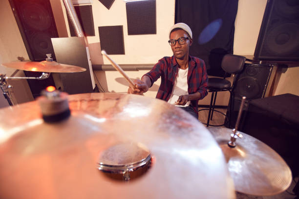 istock Contemporary African Man Playing Drums 1200778894