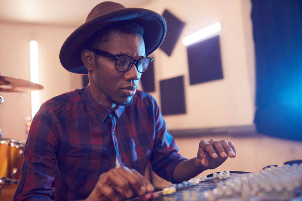 istock Young African Man Writing Music in Studio 1200779158