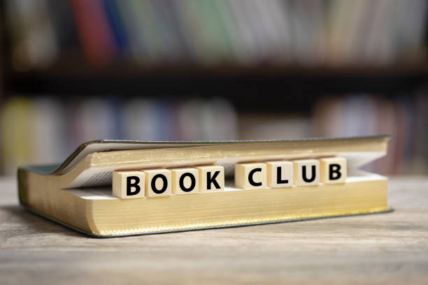 istock Book on desk with Book club text 1200780705
