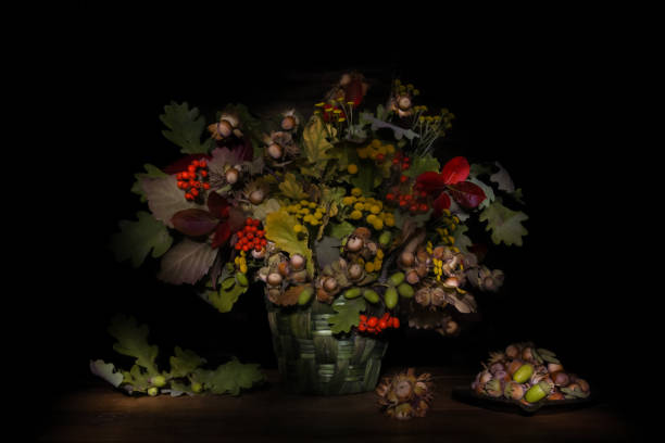 istock Autumn colorful still life bouquet on black background 1200783258