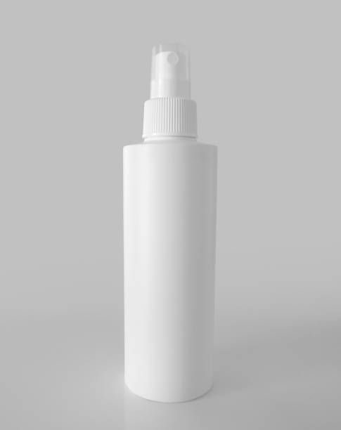 istock plastic white bottle spray on white background mockup. Fine mist ribbed sprayer isolated on white background. 1200783555
