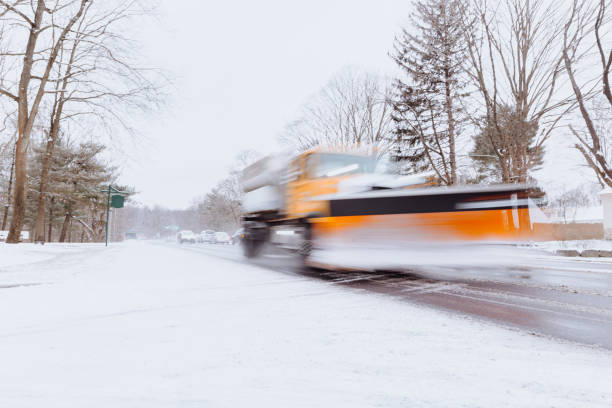 istock Truck driving in snowy weather 1200791006