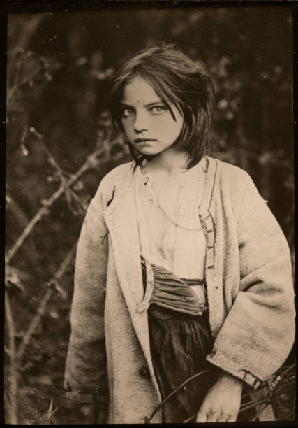 Antique photograph of poor russian peasant girl, 1890s Antique photograph of poor russian peasant girl, 1890s poverty photos stock pictures, royalty-free photos & images
