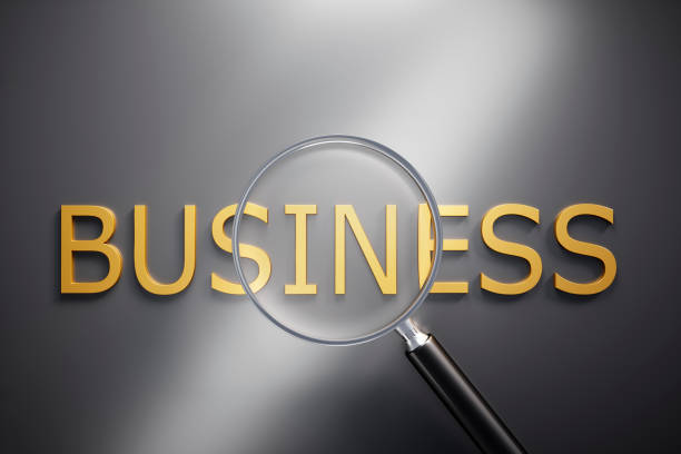 istock Magnifying Glass on Text Business 1200791313