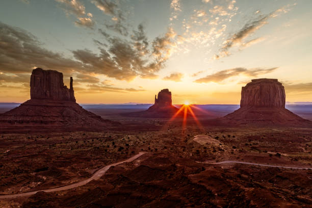 istock First sun rays at sunrise are hitting the monuments at Monument Valley 1200792726