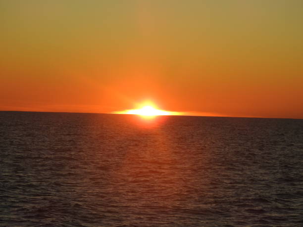 sunset Beautiful sunset above the sea sunset agadir marocco stock pictures, royalty-free photos & images