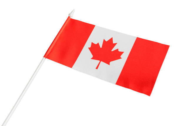 istock The Canadian flag is isolated on a white background. 1200795635