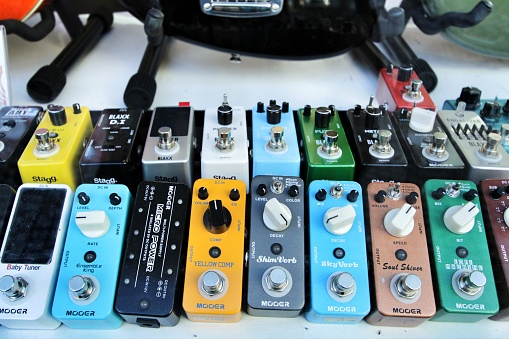 Oporto, Portugal- December 30, 2019: Different kinds of Multi-modulation pedals in a showcase in Oporto, Portugal