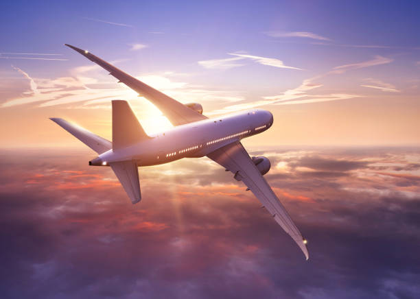 istock Passengers commercial airplane flying above clouds 1200799456