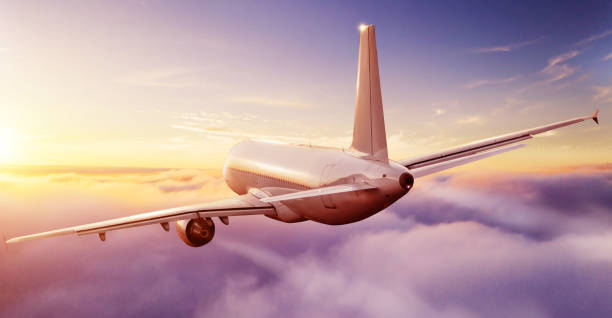 istock Passengers commercial airplane flying above clouds 1200799513