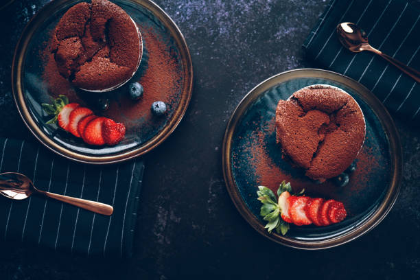istock Chocolate Souffle Served with Strawberries 1200801932