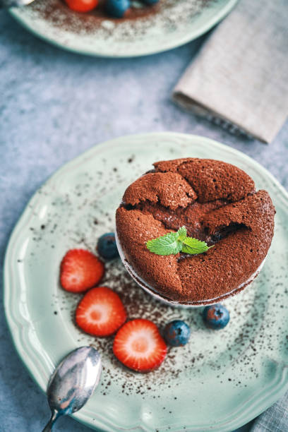 istock Chocolate Souffle Served with Strawberries 1200801933