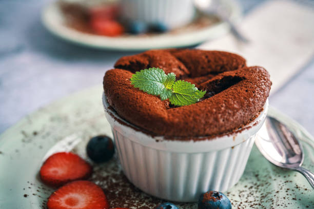 istock Chocolate Souffle Served with Strawberries 1200802028