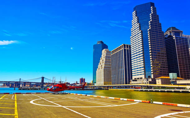istock Red Helicopter on helipad in Lower Manhattan New York reflex 1200803345