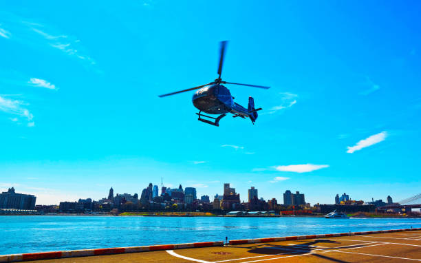 istock Black Helicopter taking off from helipad in Lower Manhattan reflex 1200803571