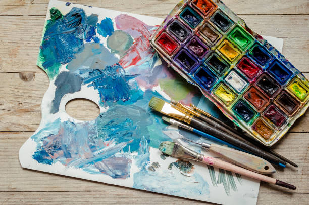 istock Artist paint brushes and watercolor paintbox 1200804664