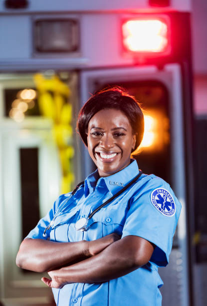 istock African-American woman working as paramedic 1200805123
