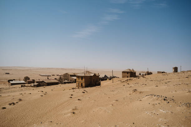 wideangle view of ghost town of Kolmanskop Luderitz in Namibia wideangle view of desert ghost town of Kolmanskop Luderitz in Namibia Africa kolmanskop namibia stock pictures, royalty-free photos & images