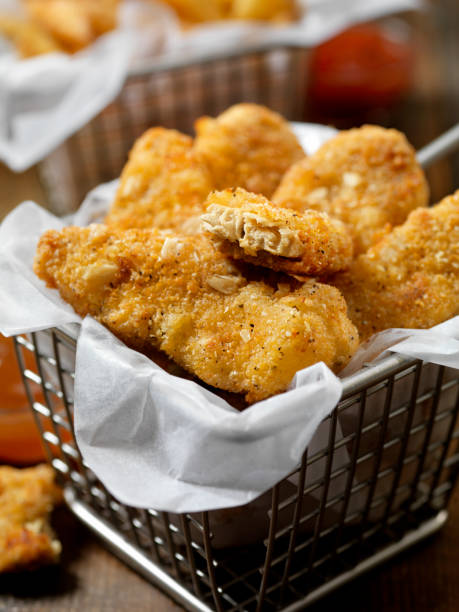 istock Vegan, Meatless-Plant Based Protein Chicken Strips with a Seven Grain Coating and Fries 1200807204