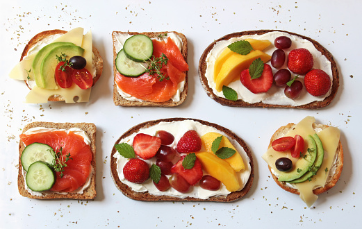 variety of open sandwiches with healthy toppings