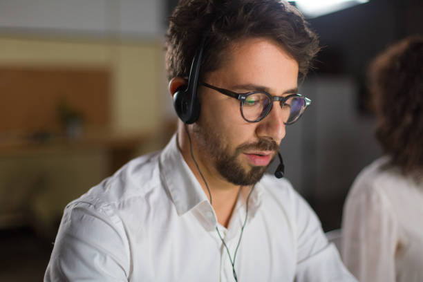 istock Closeup shot of confident call center operator 1200810075