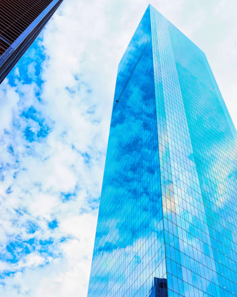istock Bottom up view of glass skyscraper 1200810328