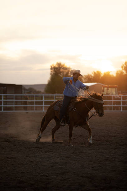 istock Cowboy warming up before event at a rodeo arena 1200810335