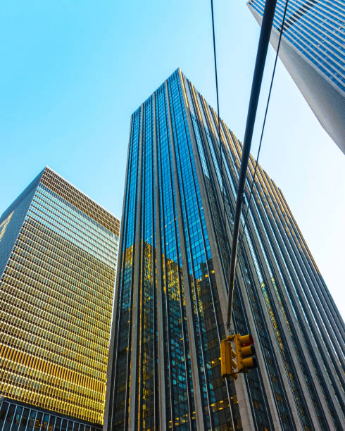 istock Bottom up view of Building and traffic lights NYC 1200810363