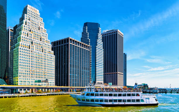 istock East River ferry boat heading Midtown Manhattan reflex 1200810631