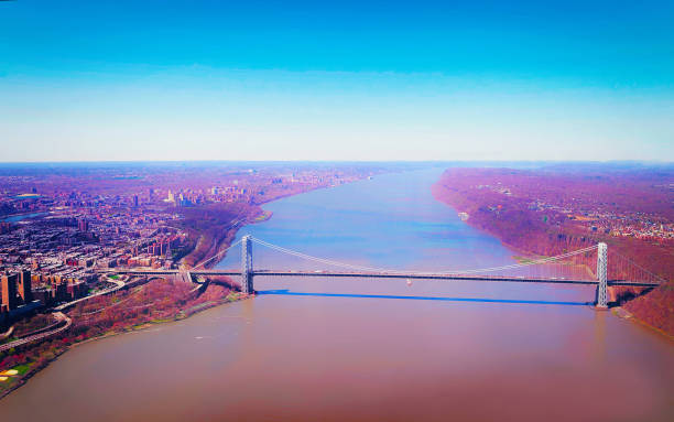 istock Williamsburg Bridge over East River between Brooklyn and Manhattan reflex 1200812144