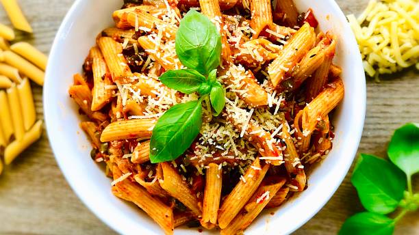 istock Penne Pasta fused with Indian Spices 1200812284