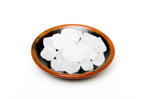 istock rock sugar in a plate on white background 1200813452