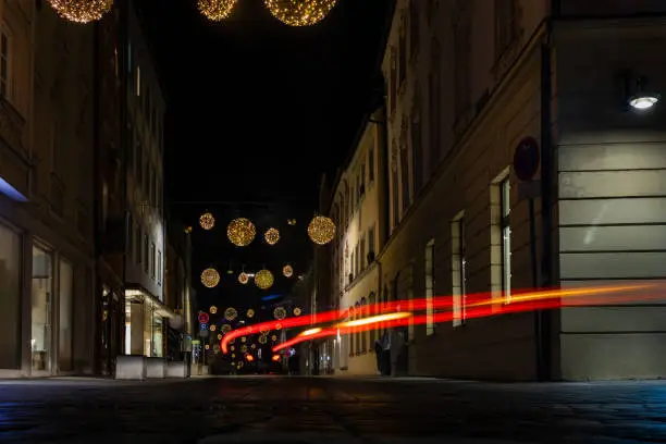 Long exposure photo of car back lights in city streets