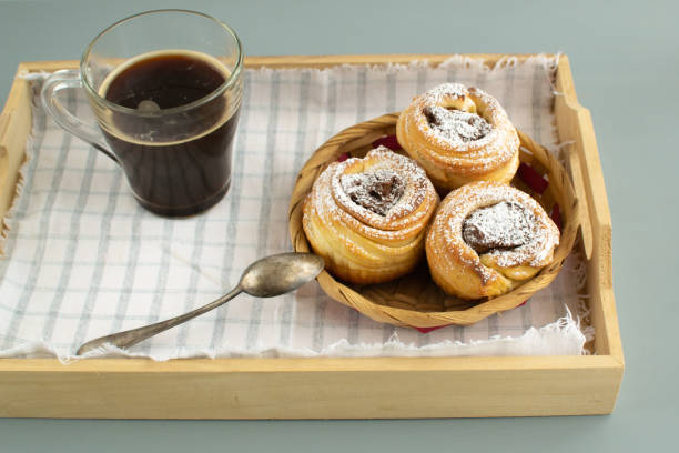 istock Cruffins with nut paste filling on a wooden tray. 1200822444