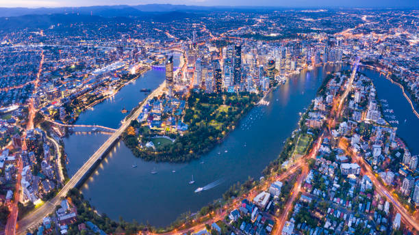 Brisbane Skyline Night Panorama, Australia Brisbane Skyline Night Panorama with the famous illuminated Story Bridge, Botanical Garden and Whell, Queensland, Australia. Converted from RAW. queensland stock pictures, royalty-free photos & images