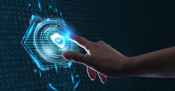 istock Cyber security data protection business technology privacy concept. Young businessman  select the icon security on the virtual display. 1200831806