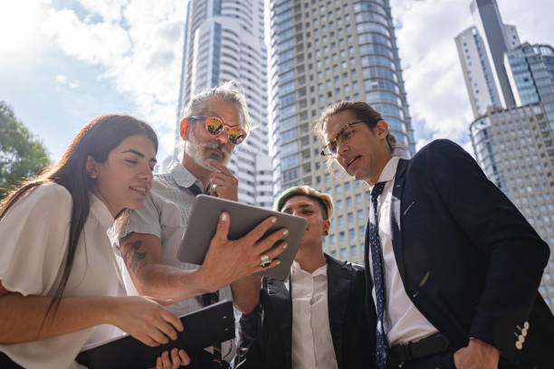 istock Business people brainstorming outdoors in the city 1200833285